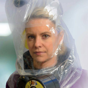 Demonstration photo of a woman wearing one of ILC Dover's escape respirators.